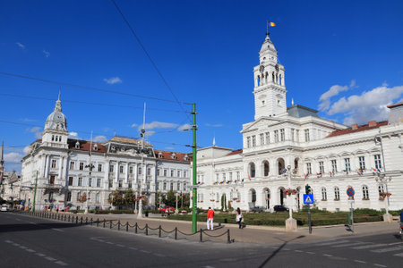 ARAD, ROMANIA - AUGUST 13, 2012: People visit the City Hall in Arad, Romania. Arad is the capital city of Arad County and 12th most populous Romanian city. It dates back to 11th century.のeditorial素材