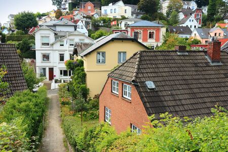 Hamburg, Germany - Blankenese, famous suburb of narrow pedestrian paths and stairways. View with...