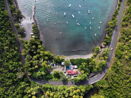 Guadeloupe beach drone sunset view. Harbor bay aerial view in Marigot.の写真素材