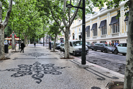 LISBON, PORTUGAL - JUNE 6, 2018: Avenida da Liberdade (Liberty Avenue) in Lisbon, Portugal. This famous boulevard is renowned for luxury brand shopping and prime real estate.のeditorial素材