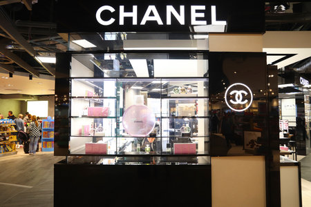 LUTON, UK - JULY 15, 2019: Chanel fashion store among duty free shops at London Luton Airport in the UK. It is UK's 5th busiest airport with 16.5 million annual passengers.のeditorial素材