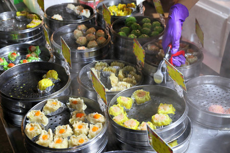 TAIPEI, TAIWAN - DECEMBER 4, 2018: Chinese dumplings at Raohe Night Market in Taipei. Night food markets are a big part of Taiwanese culture.のeditorial素材