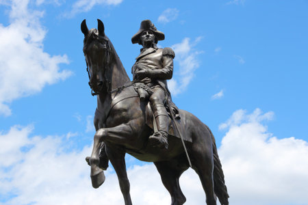 BOSTON, USA - JUNE 9, 2013: Washington Monument at Public Garden in Boston. Public Garden dates back...