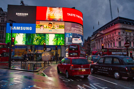 LONDON, UK - MAY 13, 2012: People visit Piccadilly Circus in London, England. London is the most populous city in the UK with 13 million people living in its metro area.のeditorial素材