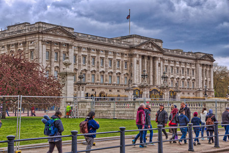 LONDON, UK - APRIL 23, 2016: People visit Buckingham Palace in London, UK. London is the most populous city in the UK with 13 million people living in its metro area.のeditorial素材