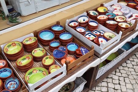 Traditional Portuguese pottery - typical handicraft souvenirs in Albufeira, Portugal.の写真素材