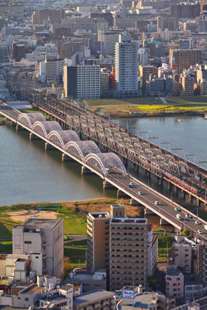 OSAKA, JAPAN - APRIL 27, 2012: Cityscape view in Osaka, Japan. Osaka is the 3rd largest city in Japan (2.8 million people) with population of metro area reaching 19 million people.のeditorial素材