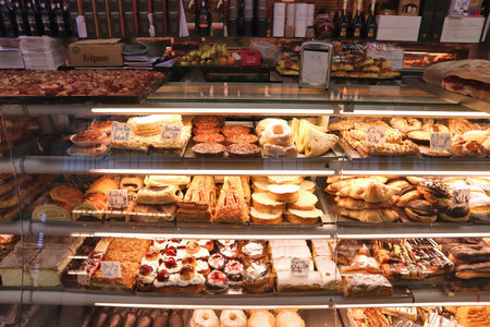 PORTO, PORTUGAL - MAY 24, 2018: Typical local bakery and confectionery shop in Porto, Portugal. Porto is the 2nd largest city in Portugal. Its old town is a UNESCO World Heritage Site.のeditorial素材