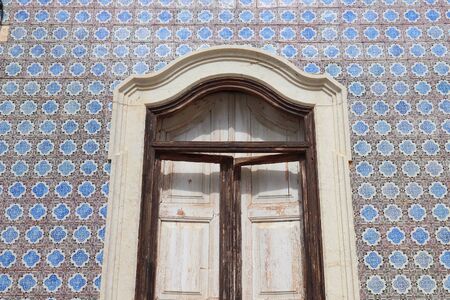 Faro, Portugal. Azulejos blue old Portuguese ceramic tiles decoration. Architecture in Portugal.の写真素材