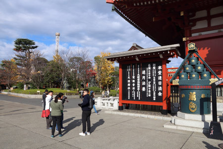 TOKYO, JAPAN - DECEMBER 2, 2016: People visit Sensoji Temple in Asakusa, Tokyo. Senso-ji Buddhist temple is dedicated to the bodhisattva Kannon.のeditorial素材