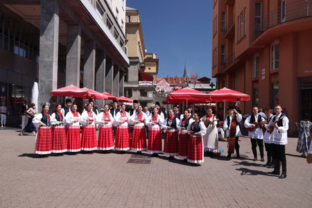 ZAGREB, CROATIA - JUNE 30, 2019: Croatian folk dancers perform in traditional costumes at a public square in Zagreb, capital city of Croatia.のeditorial素材
