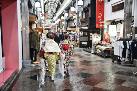 KYOTO, JAPAN - NOVEMBER 27, 2016: People shop at Shinkyogoku covered street arcade in Kyoto, Japan. Kyoto is a major city with population of 1.5 million.のeditorial素材