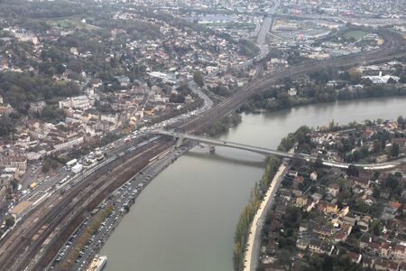 Villeneuve-Saint-Georges (left), Seine River and Villeneuve-Le-Roi (right) - aerial view of France.の写真素材