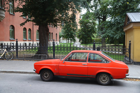 STOCKHOLM, SWEDEN - AUGUST 22, 2018: Oldtimer Ford Escort compact car parked in Stockholm, Sweden. There are 4.8 million passenger cars registered in Sweden.のeditorial素材