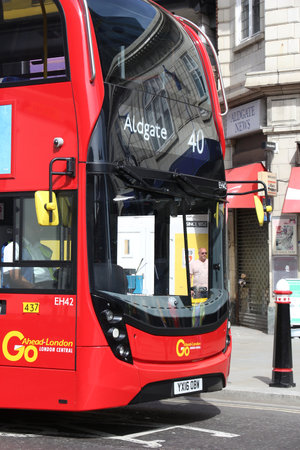 LONDON, UK - JULY 6, 2016: People ride a city bus no 40 to Aldgate in London, UK. Transport for London (TFL) operates 8,000 buses on 673 routes.のeditorial素材