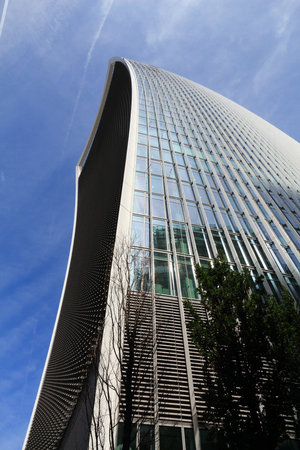 LONDON, UK - JULY 6, 2016: 20 Fenchurch Street skyscraper in London, UK. The postmodern style office building was designed by Rafael Vinoly. It is nicknamed Walkie Talkie.のeditorial素材