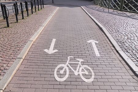 Bicycle path in Gothenburg, Sweden. Cycling transportation infrastructure. Concrete blocks paving.