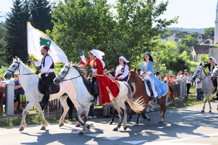 DONJI VAKUF, BOSNIA AND HERZEGOVINA - JUNE 29, 2019: Horse riders take part in Ajvatovica procession in Bosnia. Ajvatovica is the biggest Islamic traditional, religious and cultural event in Europe.のeditorial素材