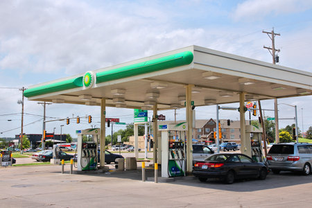GOODLAND, KS, USA - JUNE 25, 2013: People fill their tanks at BP gas station in Goodland, Kansas, USA. BP had 31.3 billion USD operating income in 2013.のeditorial素材