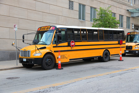 KANSAS CITY, USA - JUNE 25, 2013: Typical American school buses in Kansas City, Missouri. In 2015...