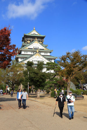 OSAKA, JAPAN - NOVEMBER 22, 2016: People visit the Castle of Osaka, Japan. It is a designated Japanese Special Historic Site.のeditorial素材