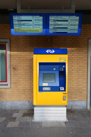EINDHOVEN, NETHERLANDS - NOVEMBER 19, 2016: Ticket machine at railway station in Eindhoven, Netherlands. The ticket machines are operated by Nederlandse Spoorwegen (Dutch Railways).のeditorial素材