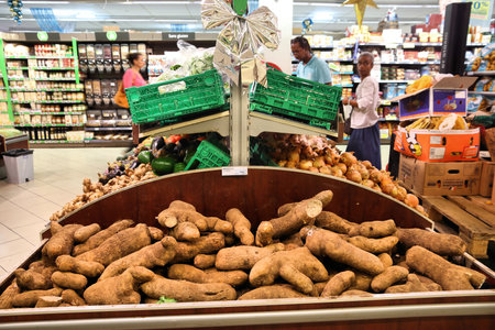 GUADELOUPE, FRANCE - DECEMBER 5, 2019: People visit vegetable section of a grocery store on Guadeloupe island in Lesser Antilles archipelago of the Caribbean.のeditorial素材