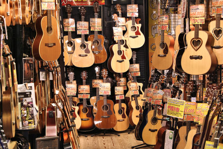 KYOTO, JAPAN - NOVEMBER 27, 2016: Specialist guitar store in Kyoto, Japan. Retail sales amounted to137.6 trillion yen in Japan in 2012.のeditorial素材