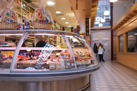 GOTHENBURG, SWEDEN - AUGUST 27, 2018: Traditional gourmet cuisine marketplace in Gothenburg, Sweden. The Stora Saluhallen market is located at Kungstorget square.のeditorial素材