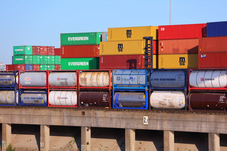 DUISBURG, GERMANY - SEPTEMBER 18, 2020: Shipping containers and tank containers in Port of Duisburg,...