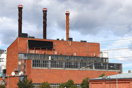 LINKOPING, SWEDEN - AUGUST 25, 2018: Combined heat and power (CHP) power station in Linkoping, Sweden. It has three boilers, powered by recycled wood, oil, biofuel and recycled car tires.のeditorial素材