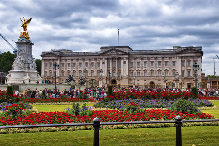 LONDON, UK - JULY 15, 2019: People visit Buckingham Palace in London, UK. London is the most populous city in the UK with 13 million people living in its metro area.のeditorial素材