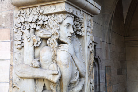 Duisburg City Hall in Germany. Architecture detail depicting Eve in the Garden of Eden being tempted by the serpent.のeditorial素材