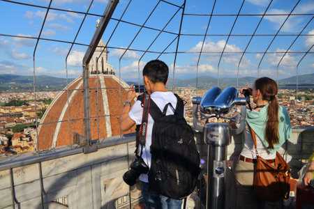 FLORENCE, ITALY - APRIL 30, 2015: People visit the viewpoint of Giotto's Campanile in Florence, Italy, a UNESCO World Heritage Site.のeditorial素材