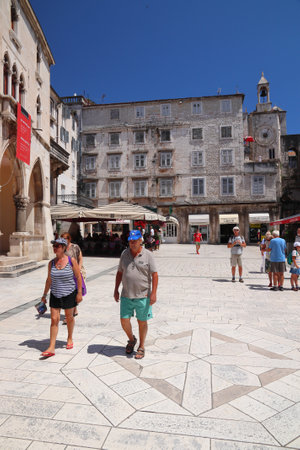 SPLIT, CROATIA - JULY 20, 2019: People visit Narodni Trg city square in Split. Croatia had 18.4 million tourist visitors in 2018.のeditorial素材