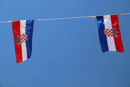 Flags of Croatia in the wind. Croatian national colors.の写真素材