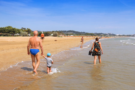 VIESTE, ITALY - JUNE 6, 2017: People visit Castello Beach in Vieste. Italy is one of most visited countries in the world with 50.7 million arrivals in 2015.のeditorial素材