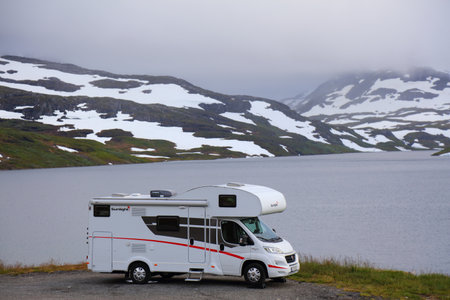 HAUKELIFJELL, NORWAY - JULY 30, 2020: Camper van vacation in Haukelifjell mountains, Norway. Norway had 8.8 million foreign visitors in 2015.のeditorial素材
