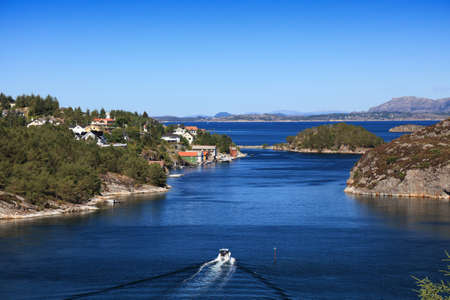 Oygarden, Norway - Misje and Sotra islands landscape. Summer in Norway. Fishing boat.
