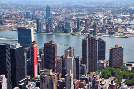 New York City - Midtown Manhattan aerial view towards Tudor City, Murray Hill and East River. On the other side: Long Island City in Queens.のeditorial素材