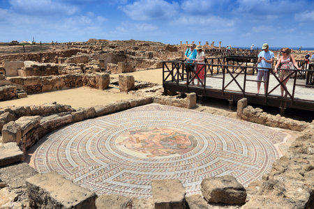 PAPHOS, CYPRUS - MAY 13, 2014: People visit Kato Paphos archeological park in Cyprus. The Greek ruins are a UNESCO World Heritage Site since 1980.のeditorial素材