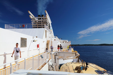 KRISTIANSAND, NORWAY - JULY 31, 2020: Passengers onboard Color Line Superspeed ferry from Norway to...