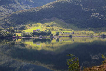 Vanylvsfjorden fiord in Norway. Norwegia fiord side village landscape.