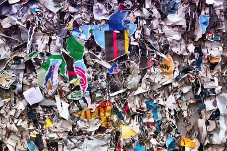 Urban texture. Background of colorful torn paper advertisement posters.の写真素材