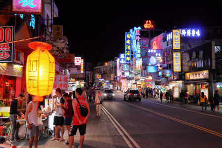 KENTING, TAIWAN - NOVEMBER 26, 2018: People visit Kenting Street Night Market in Taiwan. Night food markets are a big part of Taiwanese culture.のeditorial素材