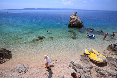 BRELA, CROATIA - JUNE 18, 2019: People spend vacation in Brela resort town in Makarska Riviera region of Dalmatia, Croatia.のeditorial素材