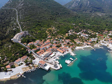 Croatia drone view. Mali Ston Bay (Malostonski Zaljev) of Adriatic Sea. Fortified town walls.