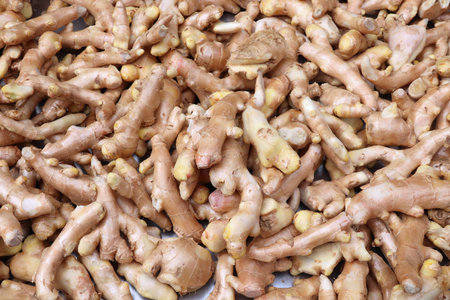 Drying ginger roots background in Taiwan. Locally grown organic ginger.