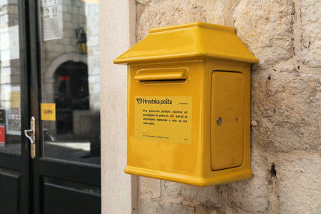 DUBROVNIK, CROATIA - JULY 18, 2021: Croatian Post (Hrvatska Posta) national postal service mailbox in Dubrovnik, Croatia.のeditorial素材