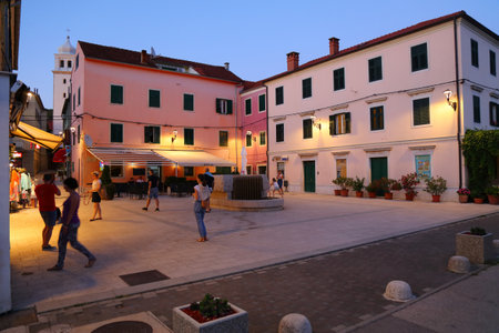 SKRADIN, CROATIA - JULY 13, 2021: People visit Skradin Old Town. Croatia had 18.4 million tourist visitors in 2018.のeditorial素材
